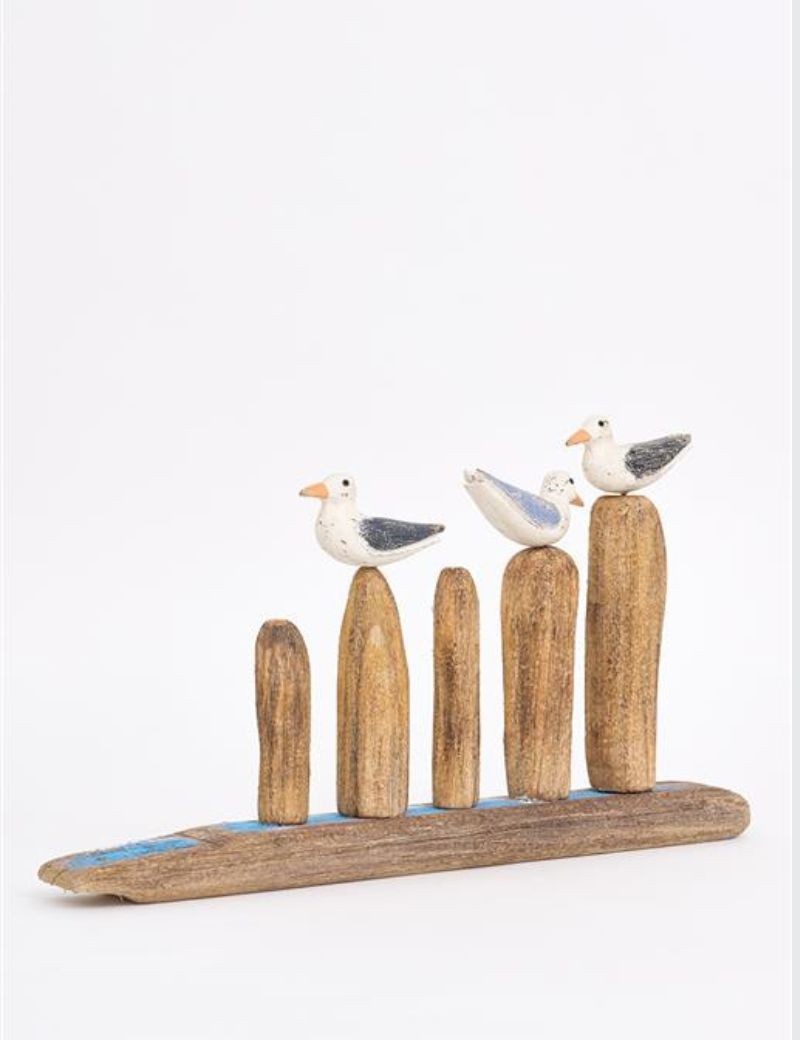 Pájaros sobre troncos natural | Sottovento